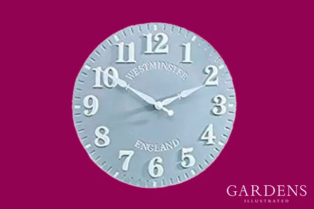 Smart Garden stone clock on a pink background