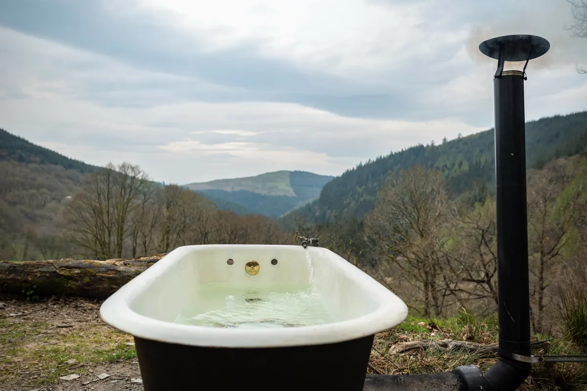 An outdoor bath tub at Eco Retreats, Machynlleth, Wales