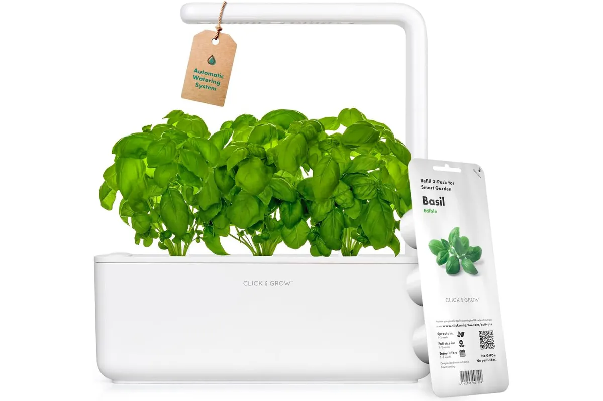 Click & Grow Indoor Herb Garden Kit with Grow Light and herb packet on a white background