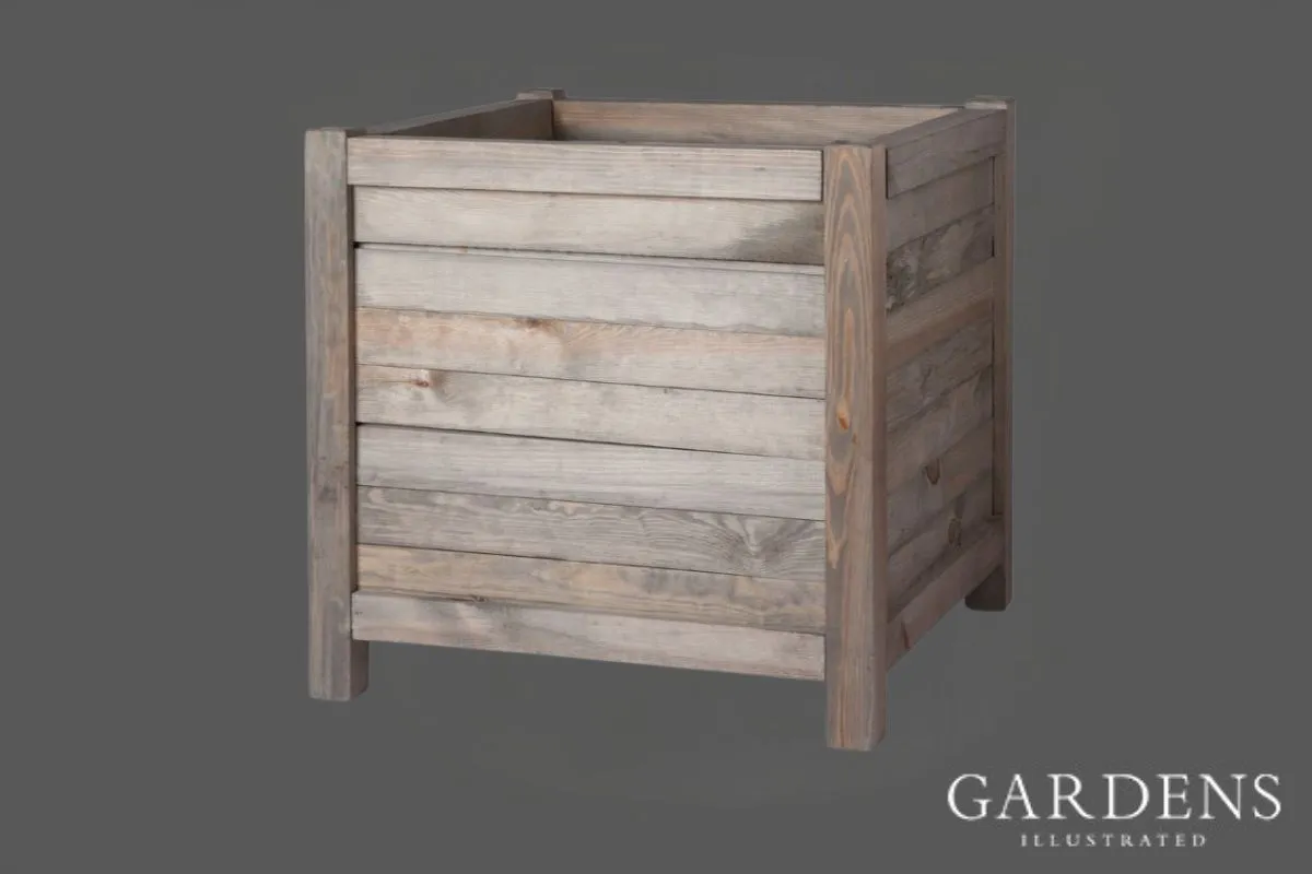Garden Trading square wooden planter on a grey background