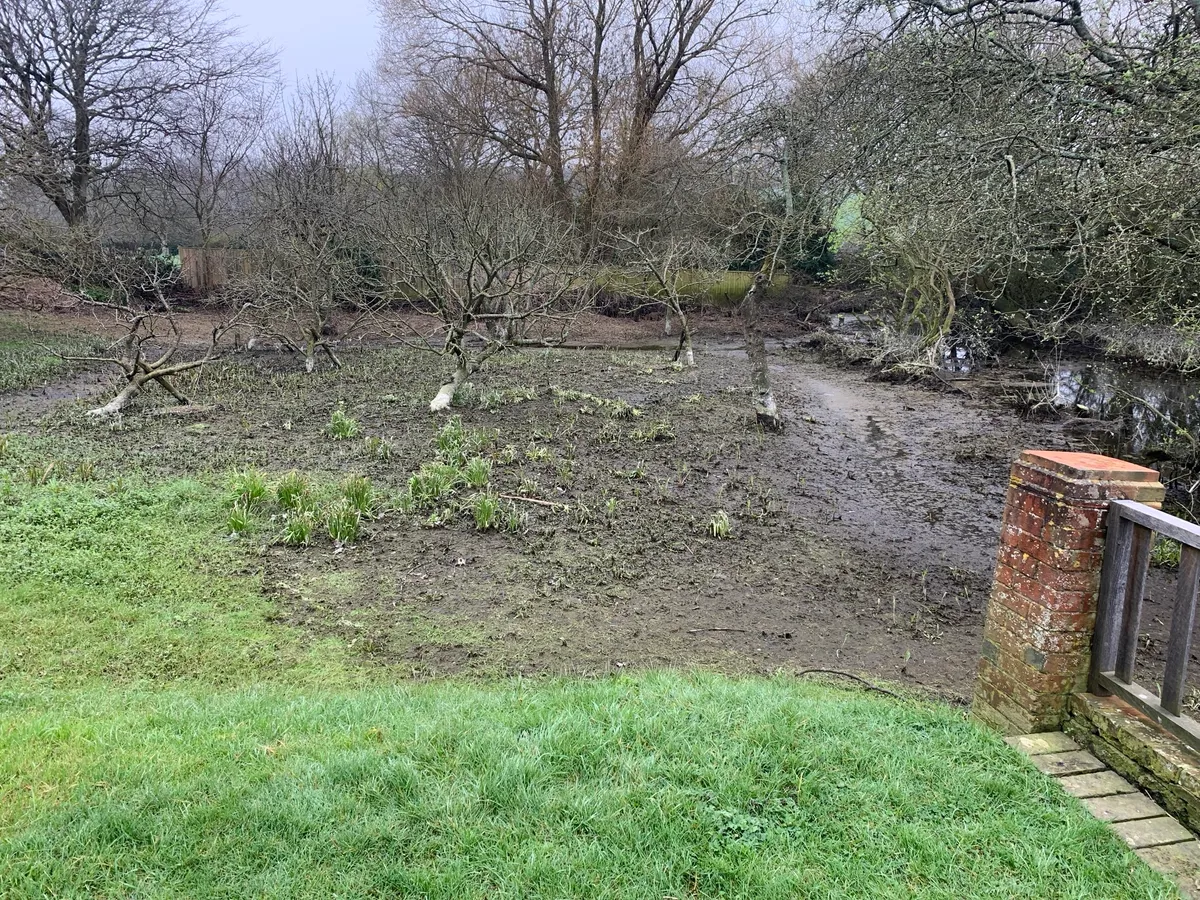 Restricted access and waterlogging in parts of the garden at Alfriston Clergy House in East Sussex