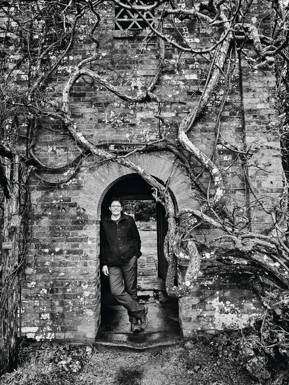 Sheila Das A woman standing in an archway