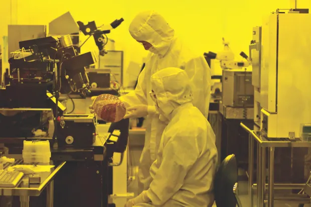 Researchers in a clean room at Hewlett-Packard Labs make memristors © Ken James/Bloomberg via Getty Images