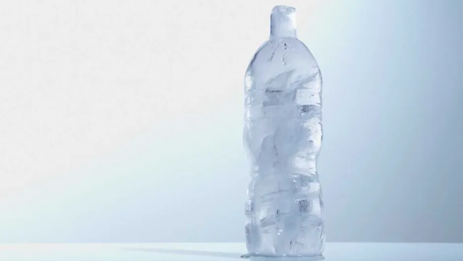 Why does water freeze instantly when you hit a bottle just out of
