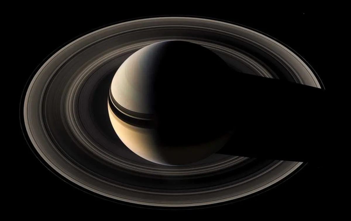 Saturn casts a shadow in its rings © NASA