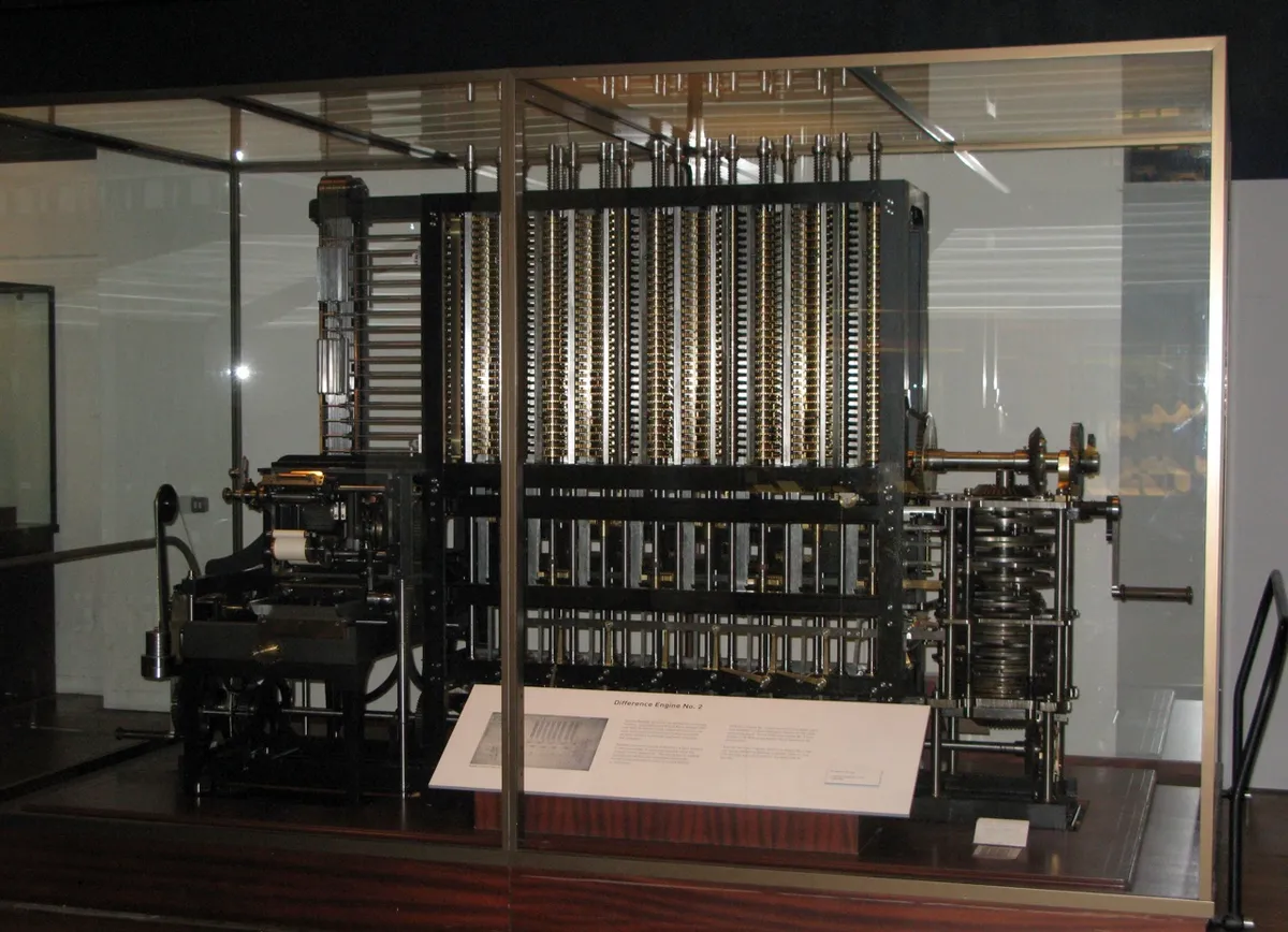 A modern version of Babbage’s Difference Engine, a precursor of the Analytical Engine – photo by User:geni - Photo by User:geni, CC BY-SA 4.0, https://commons.wikimedia.org/w/index.php?curid=4807331