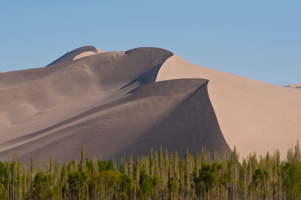 Singing sand dunes near Dunhuang, China © Bob Krist/Corbis Documentary/Getty Images
