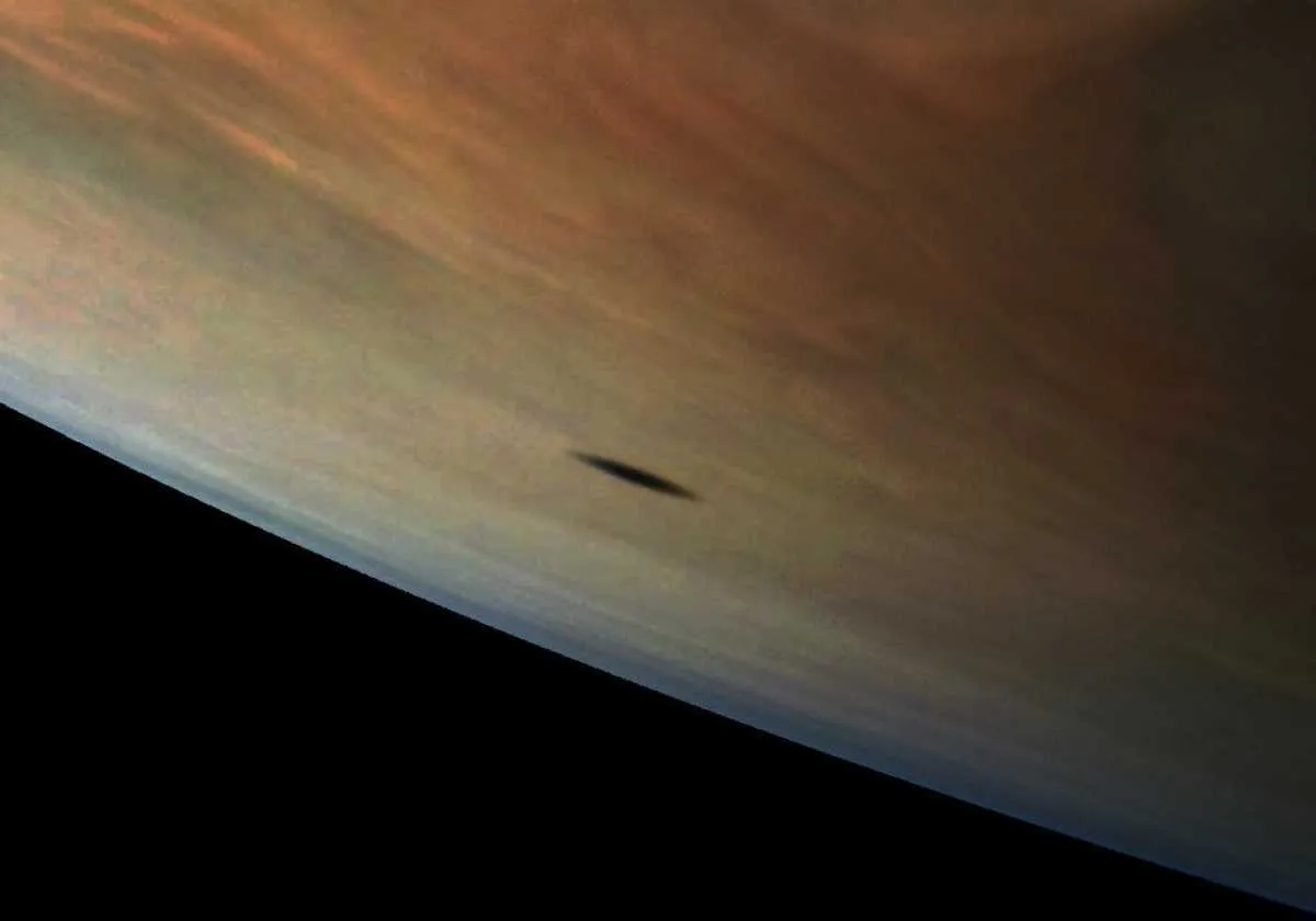 Amalthea's shadow © NASA/JPL-Caltech/SwRI/MSSS