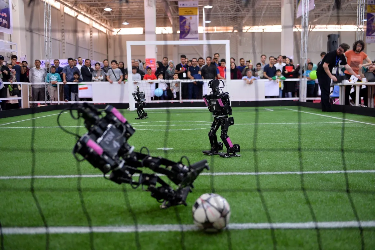Robots play football during the 13th international RoboCup competition at Tehran International Fair, Iran © Fatemeh Bahrami/Anadolu Agency/Getty Images