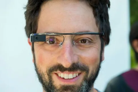 Sergey Brin tries a pair of Google Glass