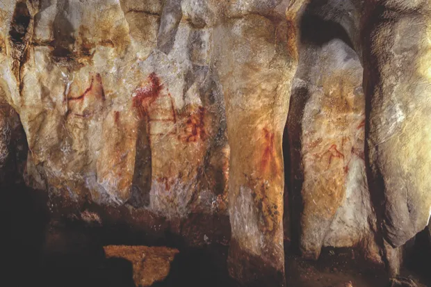 Cave art in La Pasiega, Spain, was daubed on the walls by Neanderthals some 64,000 years ago © P Saura