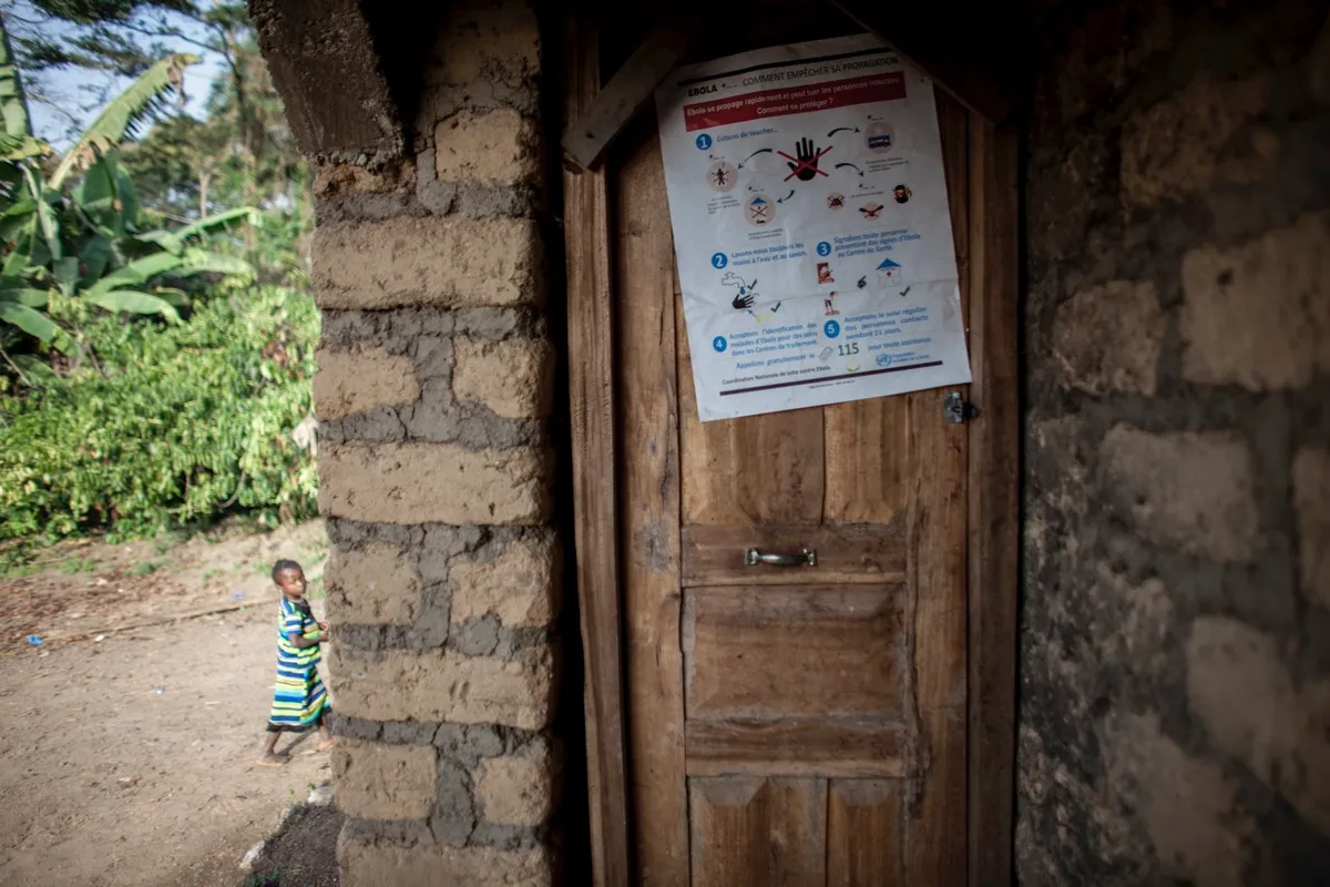 A poster promoting Ebola awareness on the door of a home in Meliandou, Guinea on January 25, 2015 © Getty Images