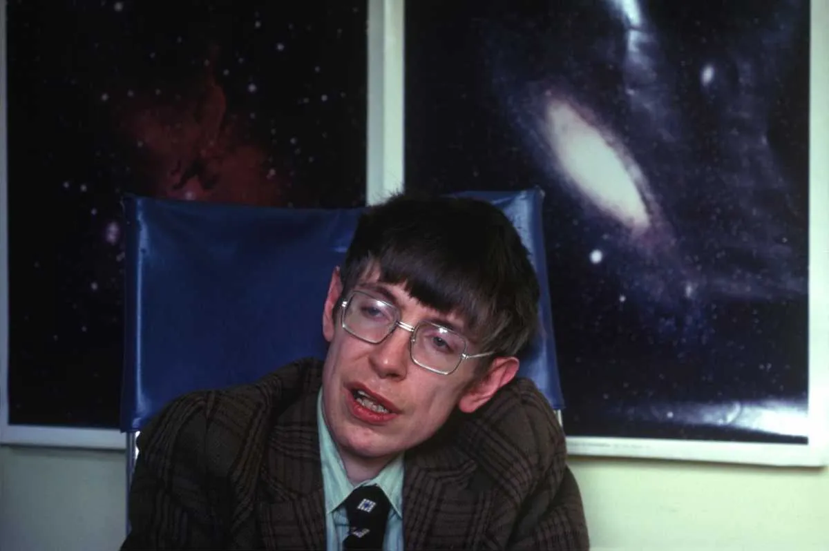 Professor Stephen Hawking in his office at the Department of Applied Mathematics and Theoretical Physics at the University of Cambridge, circa 1990 © Romano Cagnoni/Getty Images
