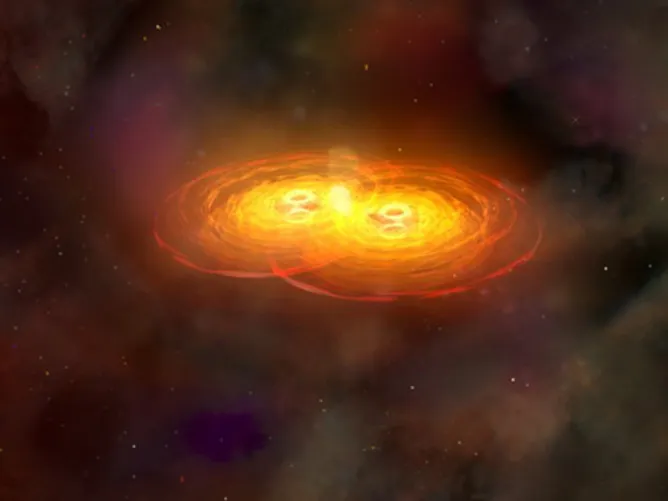 Artist’s impression of black holes merging © NASA/wikimedia