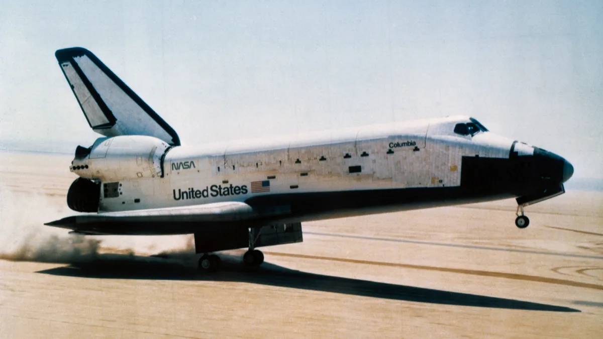 The space shuttle orbiter Columbia touches down on Rogers dry lake at Edwards Air Force Base (© NASA)