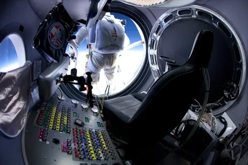 Baumgartner prepares to leave the capsule during the 71,500ft test jump © Red Bull