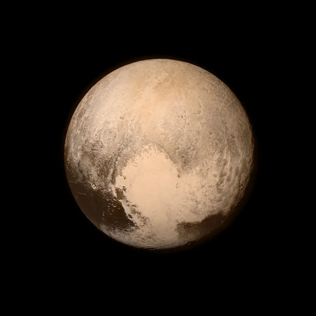 IN SPACE - JULY 14: In this handout provided by the National Aeronautics and Space Administration (NASA), Pluto nearly fills the frame in this image from the Long Range Reconnaissance Imager (LORRI) aboard NASA's New Horizons spacecraft, taken on July 13, 2015, when the spacecraft was 476,000 miles (768,000 kilometers) from the surface. This is the last and most detailed image sent to Earth before the spacecraft's closest approach to Pluto. New Horizons spacecraft is nearing its July 14 fly-by when it will close to a distance of about 7,800 miles (12,500 kilometers). The 1,050-pound piano sized probe, which was launched January 19, 2006 aboard an Atlas V rocket from Cape Canaveral, Florida, is traveling 30,800 mph as it approaches. (Photo by NASA/APL/SwRI via Getty Images)