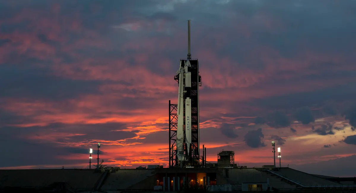 A SpaceX Falcon 9 rocket with the company's Crew Dragon spacecraft onboard is seen at sunset on the launch pad at Launch Complex 39A as preparations continue for the Demo-1 mission, Friday 1 March 2019 at the Kennedy Space Center in Florida ©NASA