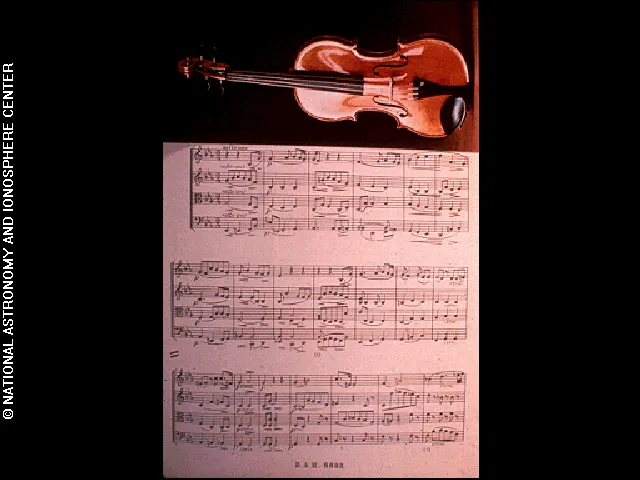 Violin with music score (Cavatina) © National Astronomy and Ionosphere Center, Cornell University (NAIC)