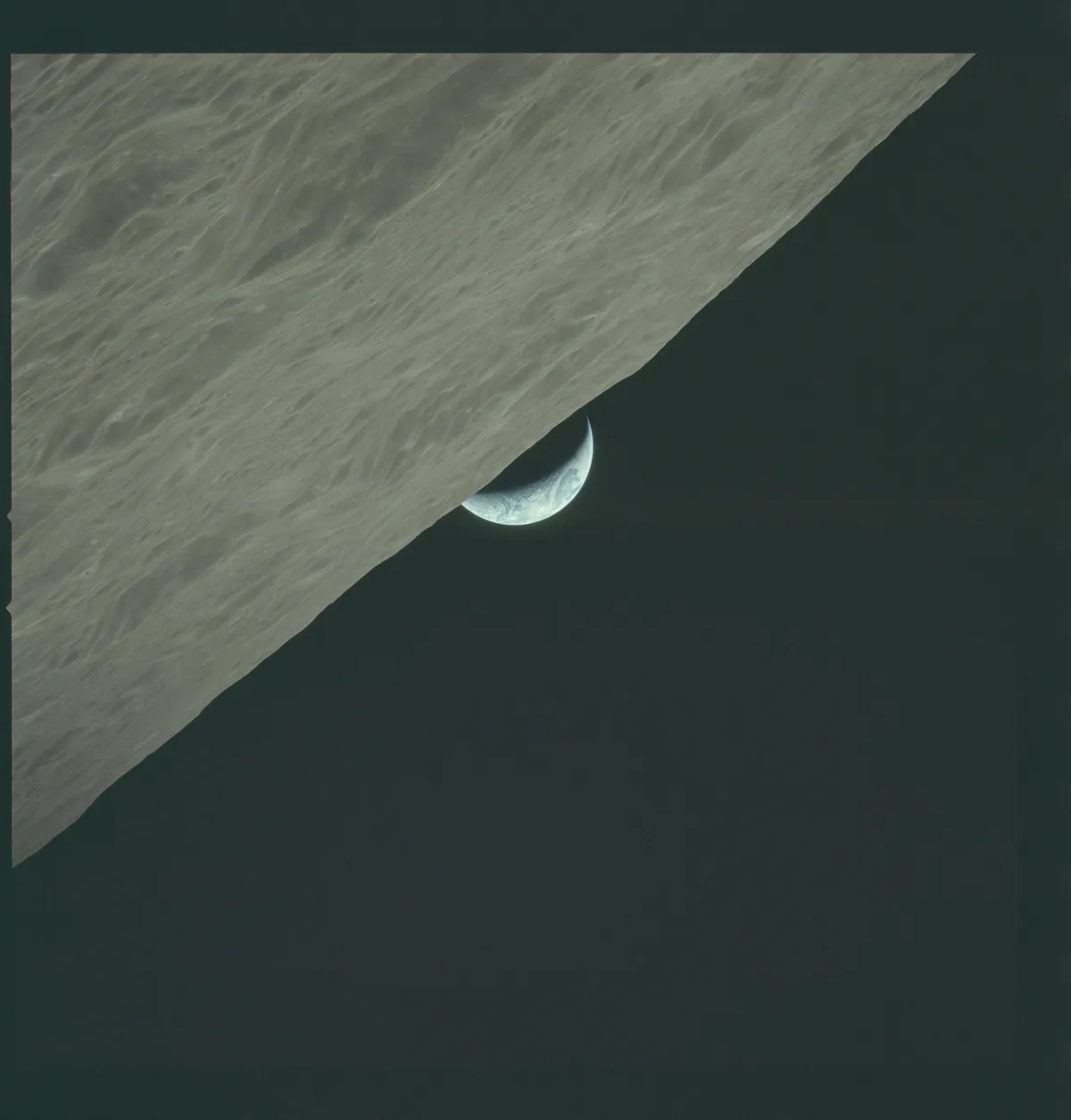 AS17-152-23273 - Apollo 17 Hasselblad image from film magazine 152/PP - Lunar orbit, Transearth coast, SIM Bay EVA / film retrieval