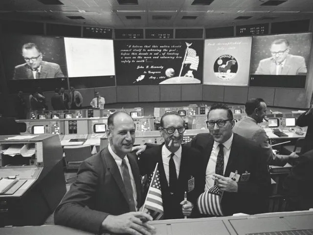 NASA officials and engineers in mission control celebrate the Apollo 11 Moon landing © Alamy