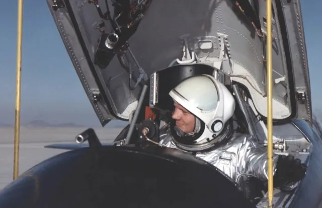 Armstrong in the cockpit of one of the three X-15 rocket planes after a research flight. He flew the X-15 seven times © NASA/JSC