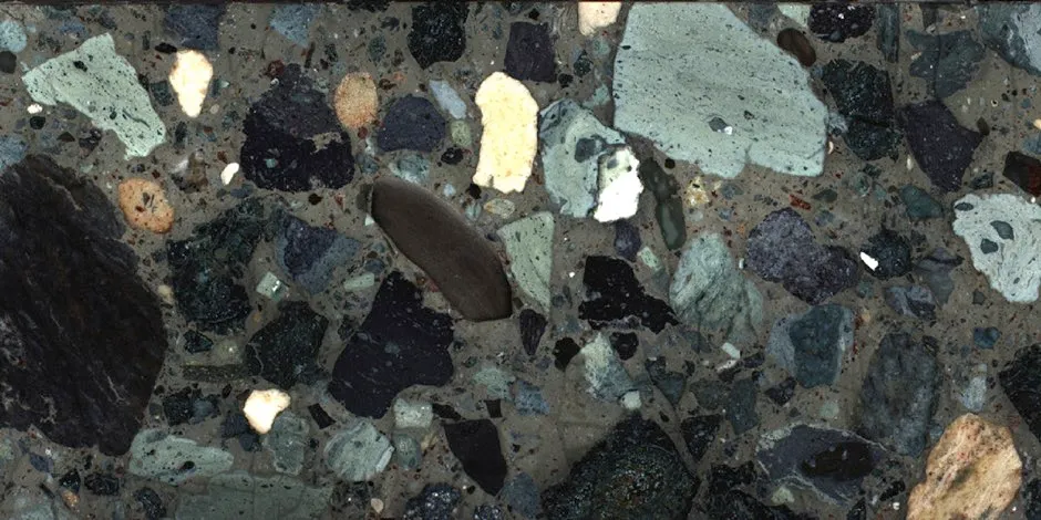 A portion of the drilled cores from the rocks that filled the crater left by the asteroid impact that wiped out the dinosaurs. © International Ocean Discovery Program