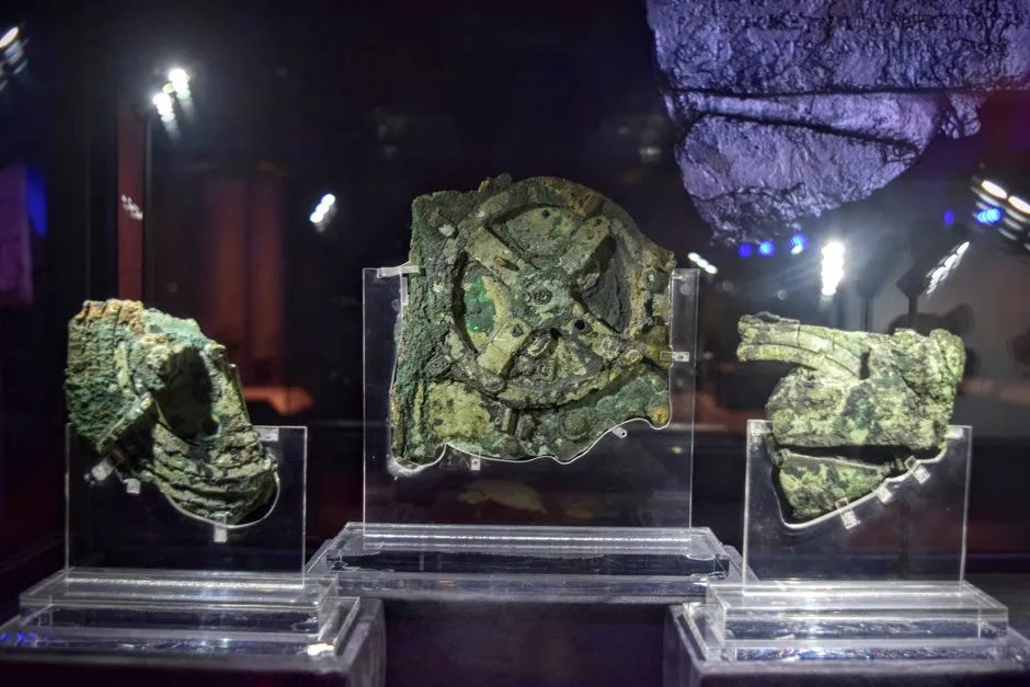 The three largest of the 82 fragments of the Antikythera Mechanism in the National Archaeological Museum, Athens © Weekend Wayfarers/Flickr