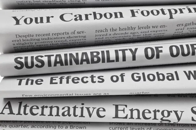 Newspapers covering climate change © Getty Images