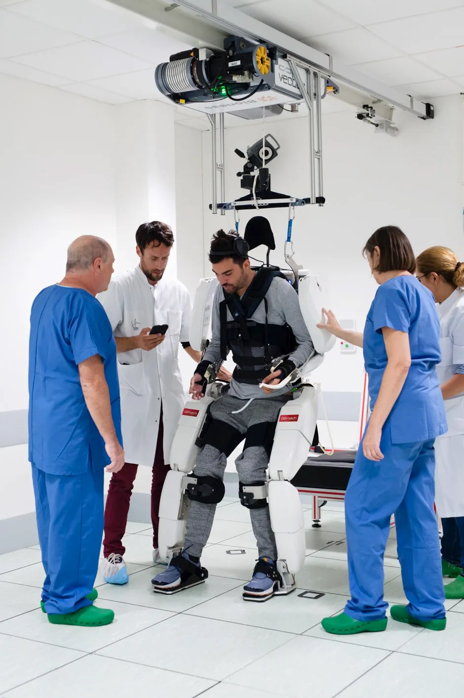 Thibault is able to walk while wearing an exoskeleton controlled by his brain signals © Clinatec/Juliette Treillet/PA