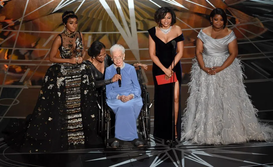 Janelle Monae, Taraji P Henson and Octavia Spencer introduce Katherine Johnson, the inspiration for Hidden Figures, as they present the award for best documentary feature at the Oscars © Chris Pizzello/Invision/AP