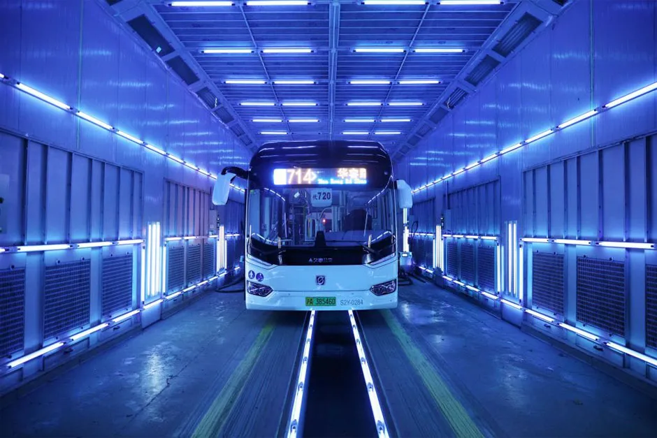 A bus in Shanghai, China is disinfected by ultraviolet light on 4 March 2020 © Getty Images