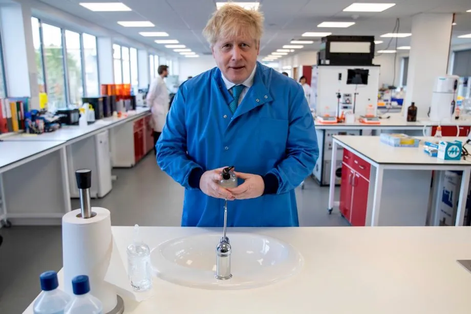 Prime Minister Boris Johnson, here seen at a lab where developing a test for COVID-19, is currently in self isolation after confirming he has contacted the coronavirus © Jack Hill/AFP/ Getty Images