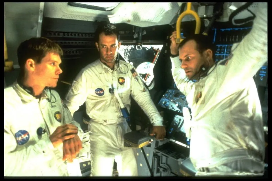 Kevin Bacon (L) as Command Module Pilot Jack Swigert, Tom Hanks (C) as Apollo 13 Commander Jim Lovell and Bill Paxton (R) as Lunar Module Pilot Fred Haise as seen in the Hollywood movie Apollo 13 © Eric Robert/Sygma/Sygma via Getty Images