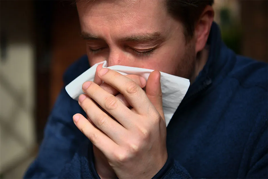 The virus is spread through cough or sneeze droplets, so make sure you catch them in a tissue you then throw away © Ben Birchall/PA