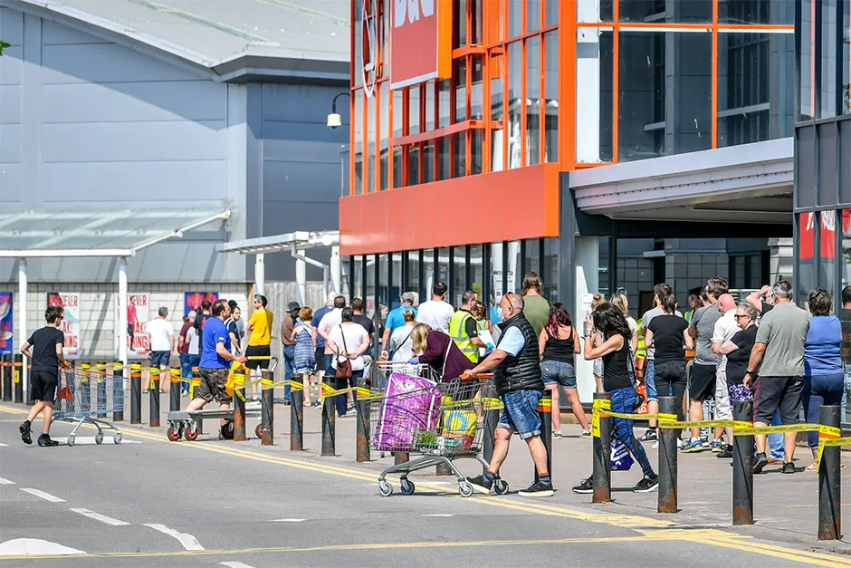 B&Q re-opened many of its stores this week and people in Bristol were pictured waiting to enter © Ben Birchall/PA