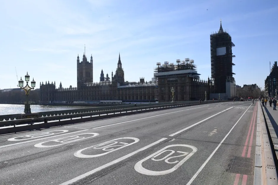 An empty Westminster Bridge and the Houses of Parliament in Westminster, London, the day after Prime Minister Boris Johnson put the UK in lockdown to help curb the spread of the coronavirus © Stefan Rousseau/PA