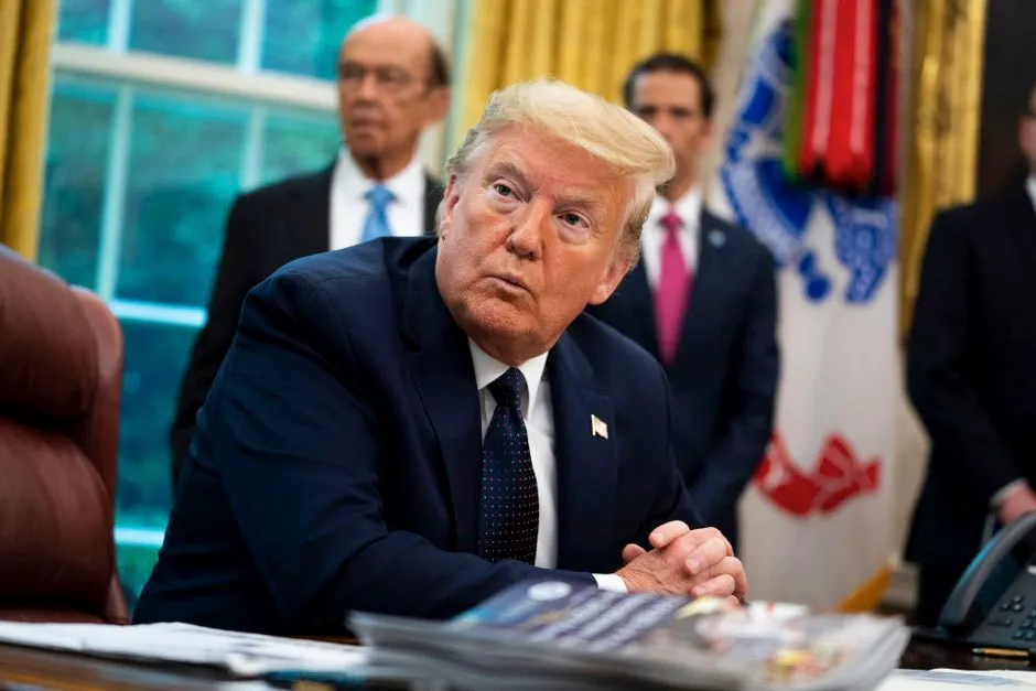 U.S. President Donald Trump receives a briefing on the 2020 hurricane season in the Oval Office May 28, 2020 in Washington, DC. (Photo by Doug MIlls-Pool/Getty Images)