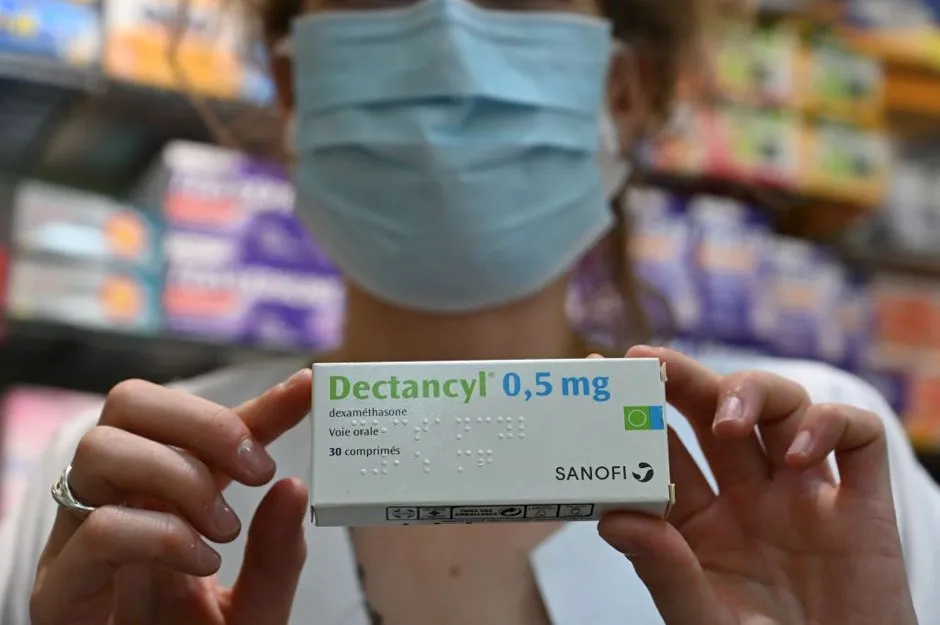 A picture taken on June 16, 2020 in Paris shows a box of Dectancyl, a drug manufactured by Sanofi containing dexamethasone © Bertrand Guay/AFP via Getty Images