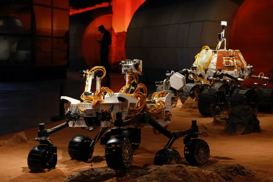 A display depicting rovers on Mars during an exhibition in Beijing © Ng Han Guan/AP