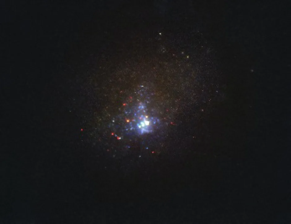 Kinman Dwarf galaxy, located around 75 million light-years away from Earth © NASA/ESA