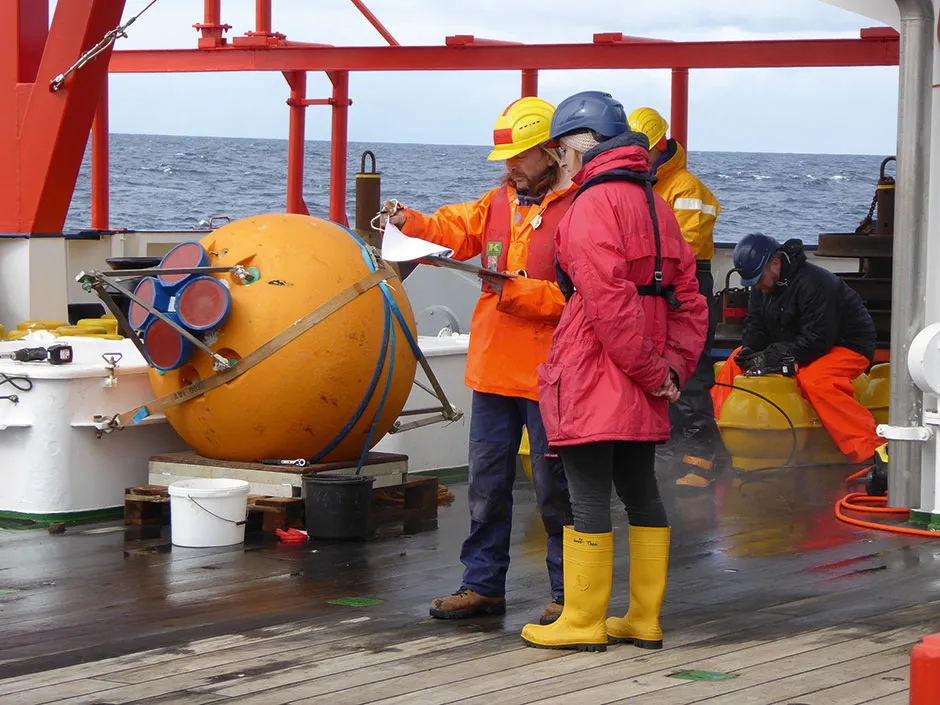 These ball-like devices float just below the ocean surface and are connected to the seabed by mooring line. The line has sensors located along it to measure different water variables © Penny Holliday/NOC