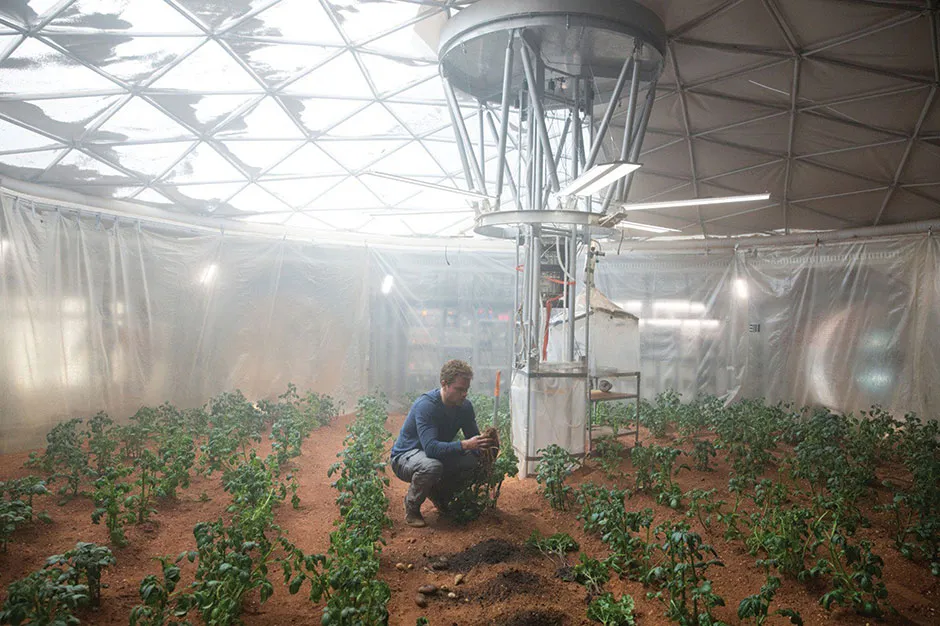 Image of Matt Damon cultivating potatoes in The Martian © Shutterstock