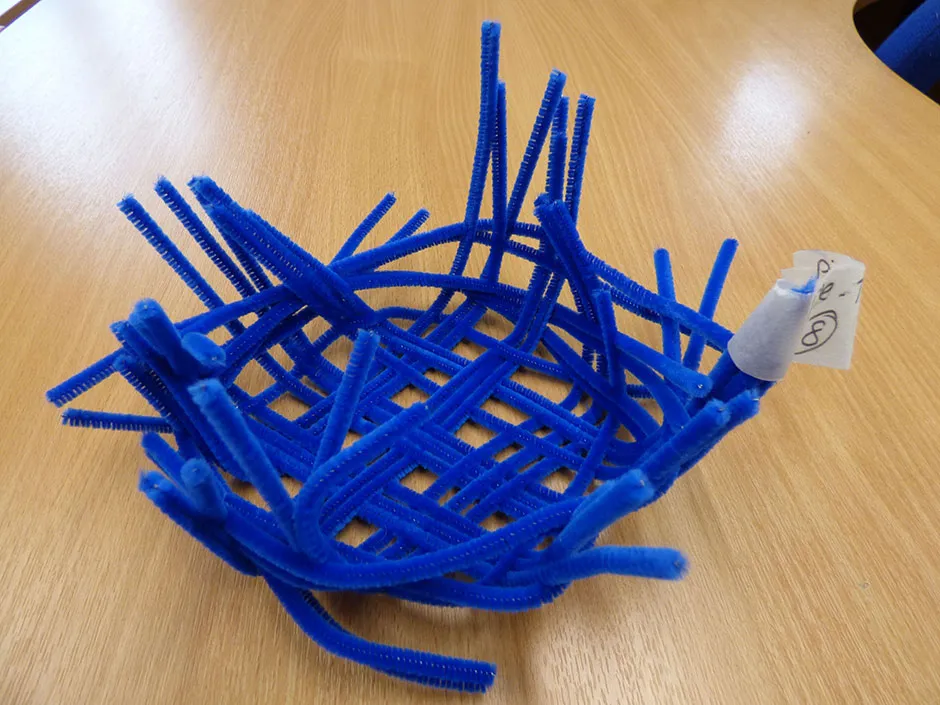 A basket made of pipe cleaners – a “complex” tool created by the study participants © University of Exeter