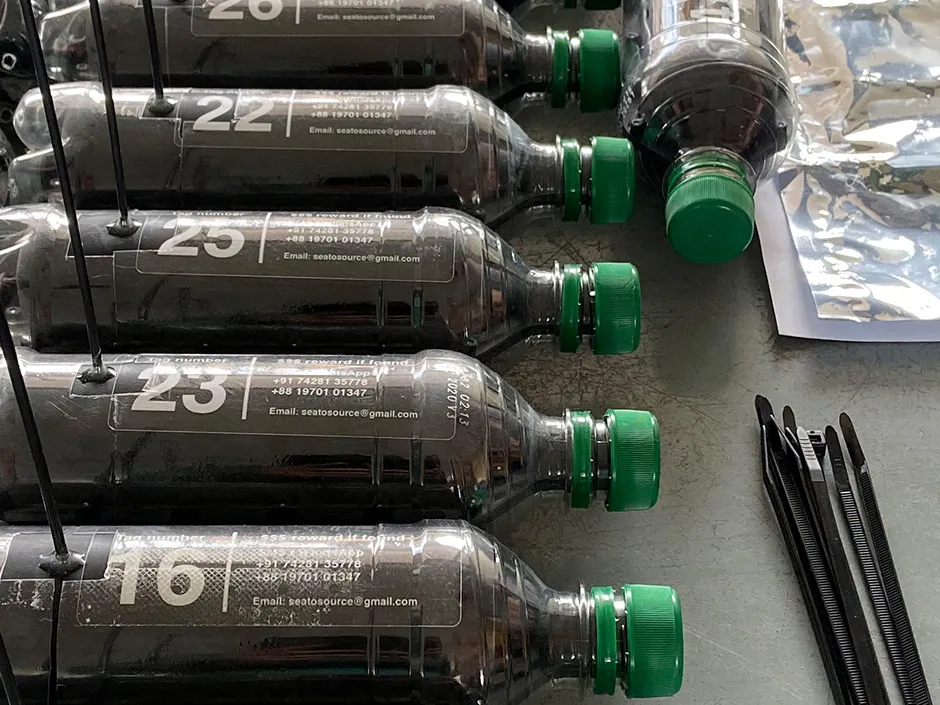 Bottle tags ready for release © Heather Koldewey