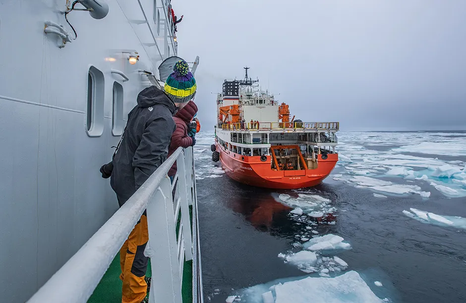 Marce Nickolas, Ice Team member of Leg 5, looks out at the Russian icebreaker Tryoshnikov as the Polarstern heads North to continue to MOSAiC mission. Bon voyage, Leg 4!