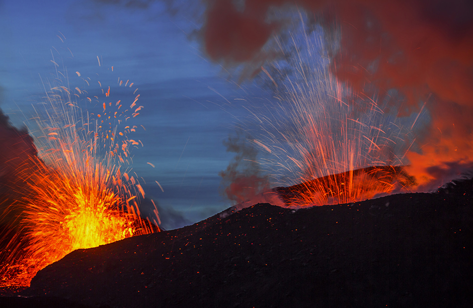 The best time to photograph the eruption of the Plosky Tolbachik volcano in Kamchatka, Russia is at dusk. Then it's not too dark around, the color of the sky is beautiful, and the magma looks beautiful and sparkling. Indeed, this can be very dangerous...