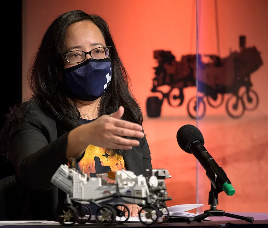PASADENA, CA - FEBRUARY 19: In this handout image provided by NASA, Mars 2020 Strategic Mission Manager Pauline Hwang, gives remarks during a NASA Perseverance rover initial surface checkout briefing, Friday Feb. 19, 2021, at NASA's Jet Propulsion Laboratory in Pasadena, California. The Perseverance Mars rover landed on Mars Thursday, Feb. 18, 2021. A key objective for Perseverances mission on Mars is astrobiology, including the search for signs of ancient microbial life. The rover will characterize the planets geology and past climate, pave the way for human exploration of the Red Planet, and be the first mission to collect and cache Martian rock and regolith. (Photo by Bill Ingalls/NASA via Getty Images)