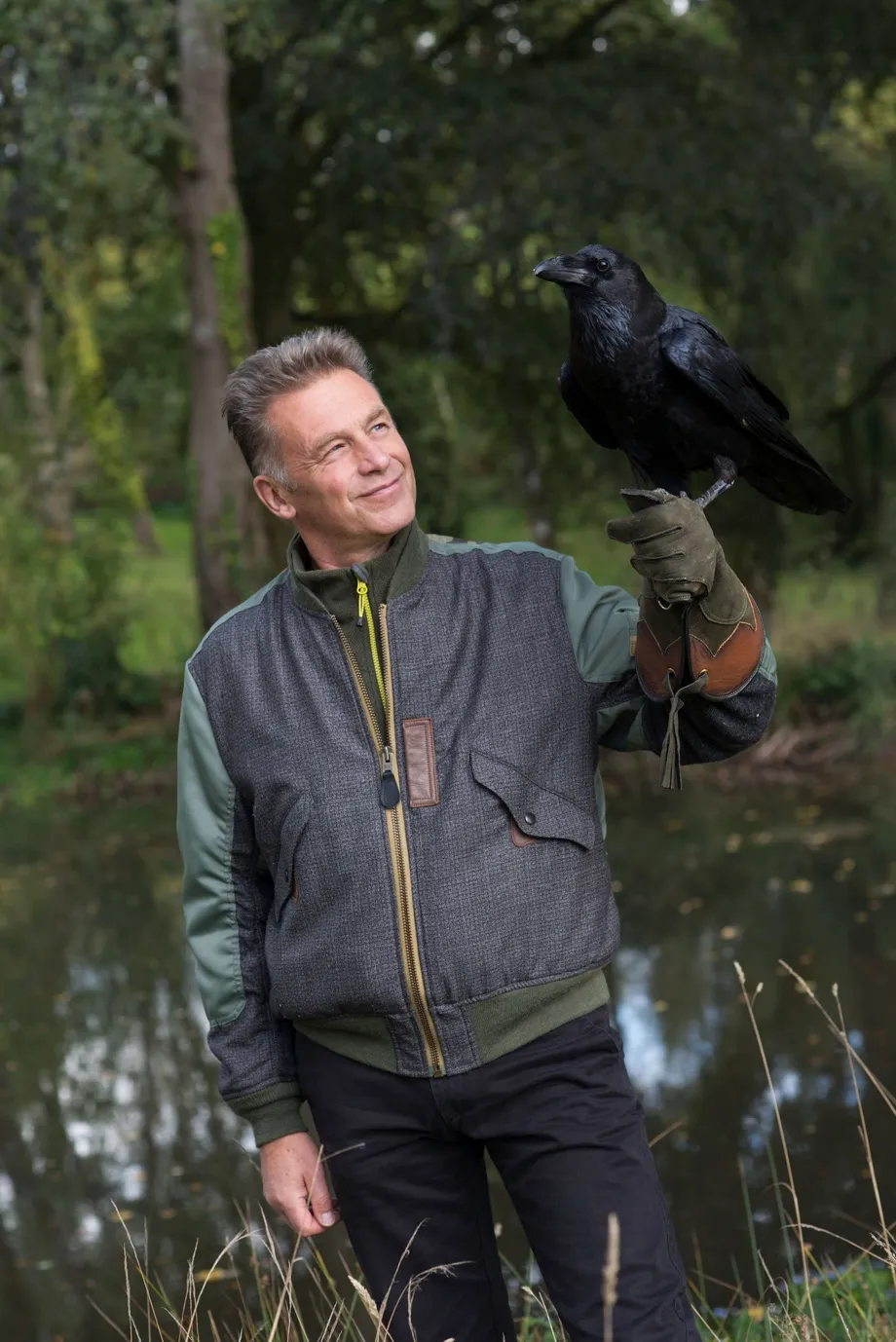 Chris Packham with Bran the raven © BBC/Lucy Bowden