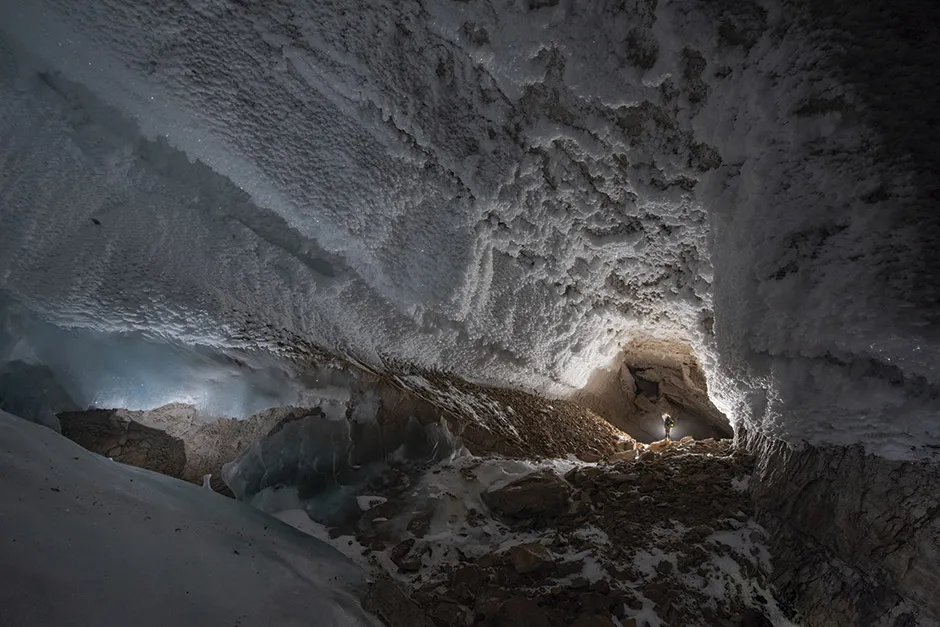 The Full Moon Hall chamber, a long, cavernous area of the cave covered in ice © Robbie Shone